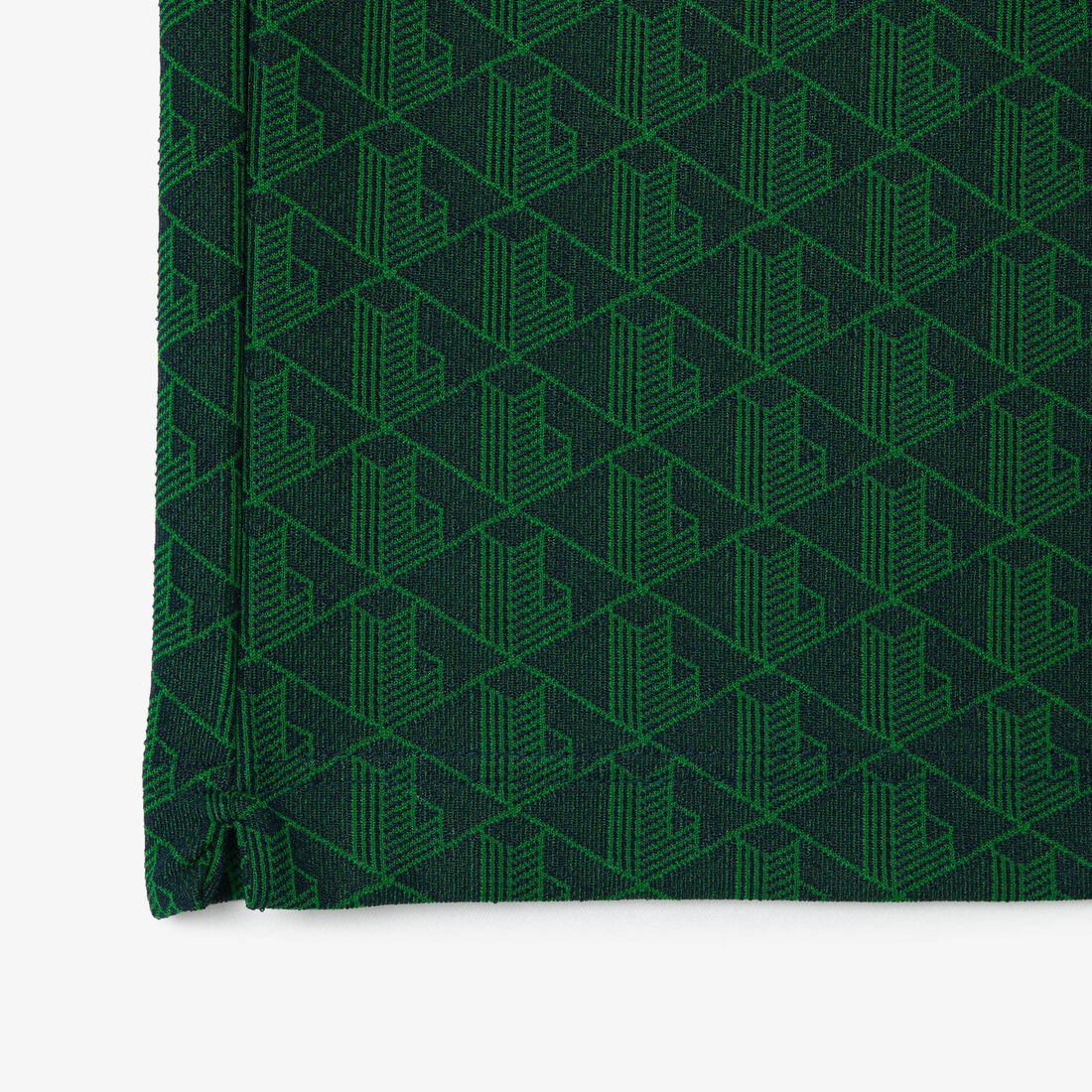 Lacoste monogram jacquard polo shirt by ATHENA ™, featuring a textured monogram pattern and classic polo collar.