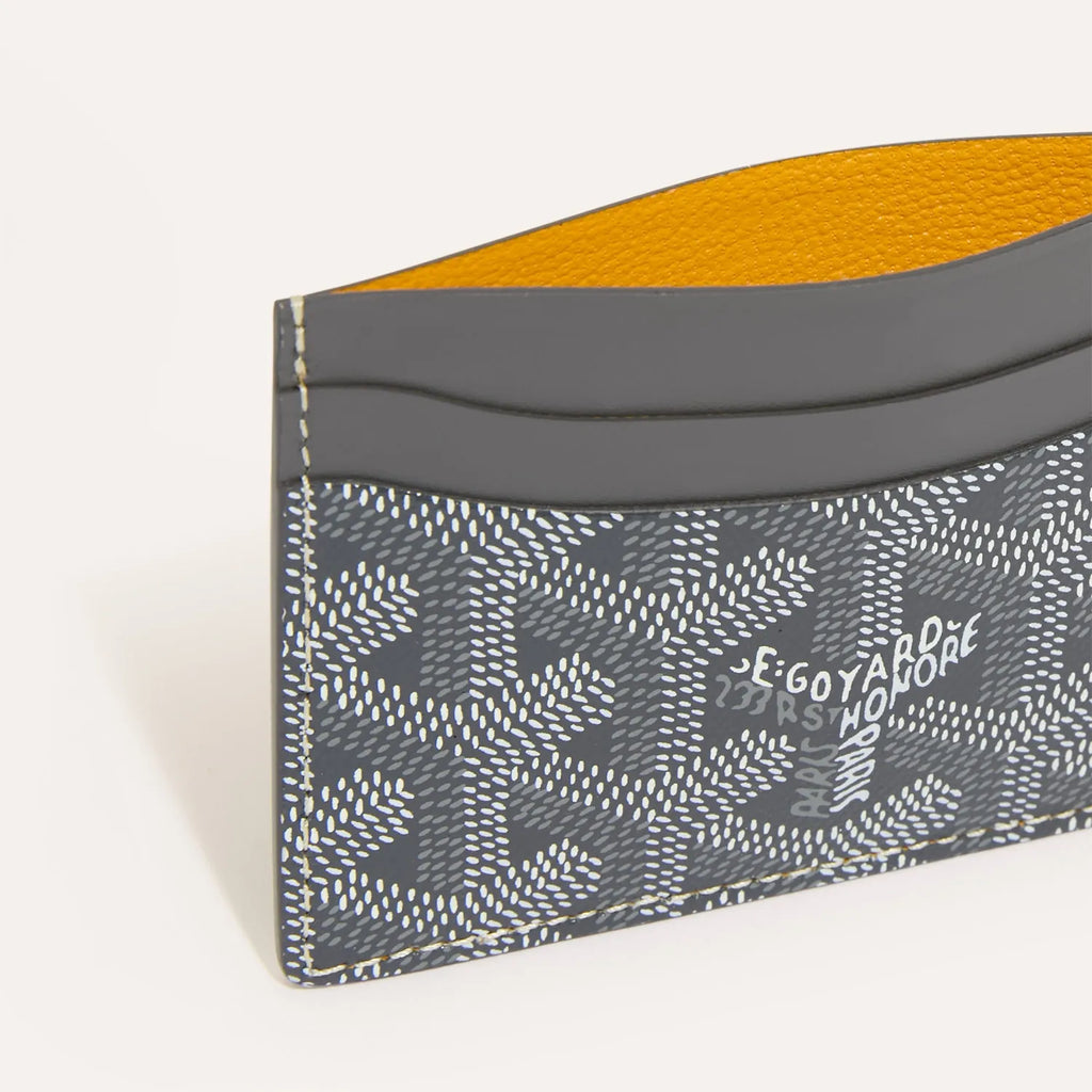 Athena™ GOYARD Saint-Sulpice cardholder in leather, featuring multiple card slots and sleek design.
