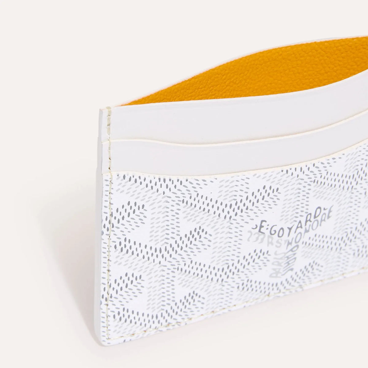 ATHENA™ GOYARD Saint-Sulpice cardholder in leather with multiple card slots and sleek design, displayed on a neutral background.