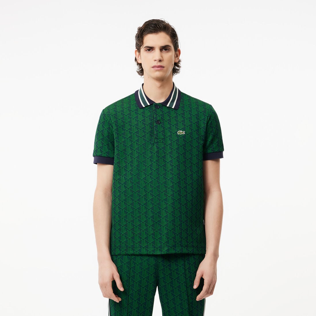 Athena LACOSTE Monogram Jacquard Polo shirt featuring a classic collar and embroidered crocodile logo on the chest.