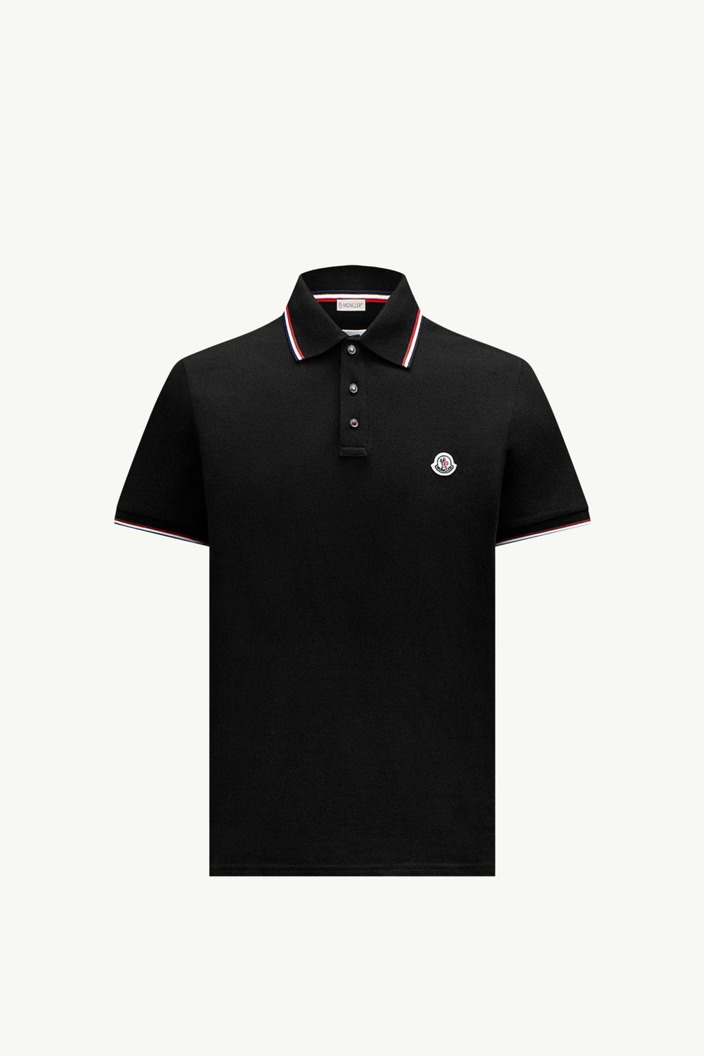 Athena™ Moncler piquet polo shirt in classic style, featuring a collared design and short sleeves, displayed on a hanger.