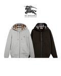 Athena Burberry zipper showing a sleek metal zipper with branded pull tab on a fabric background.