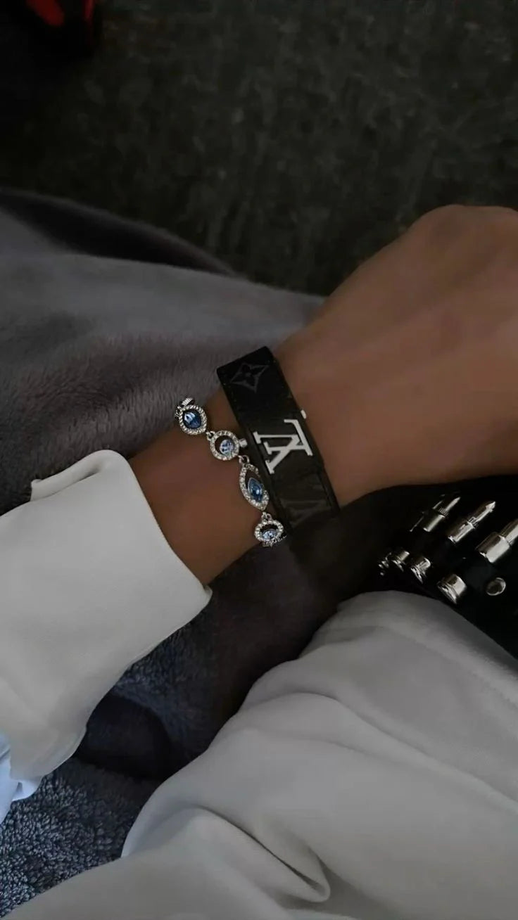 Athena LV leather slim bracelet featuring a sleek, minimalist design with a smooth leather band and subtle brand accents.