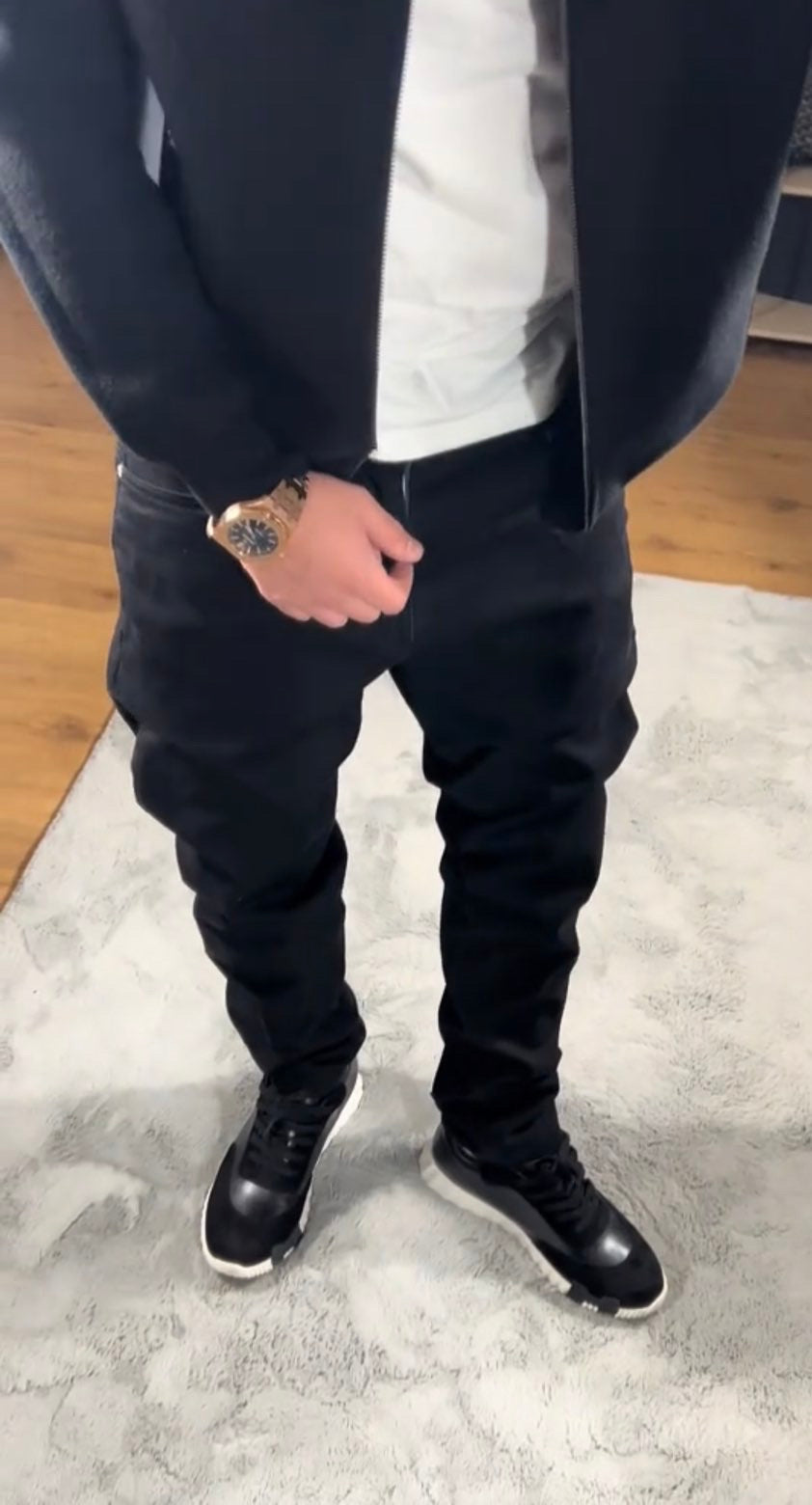 Black Prada stack jeans by ATHENA ™, showcasing the stylish layered denim design and classic fit.