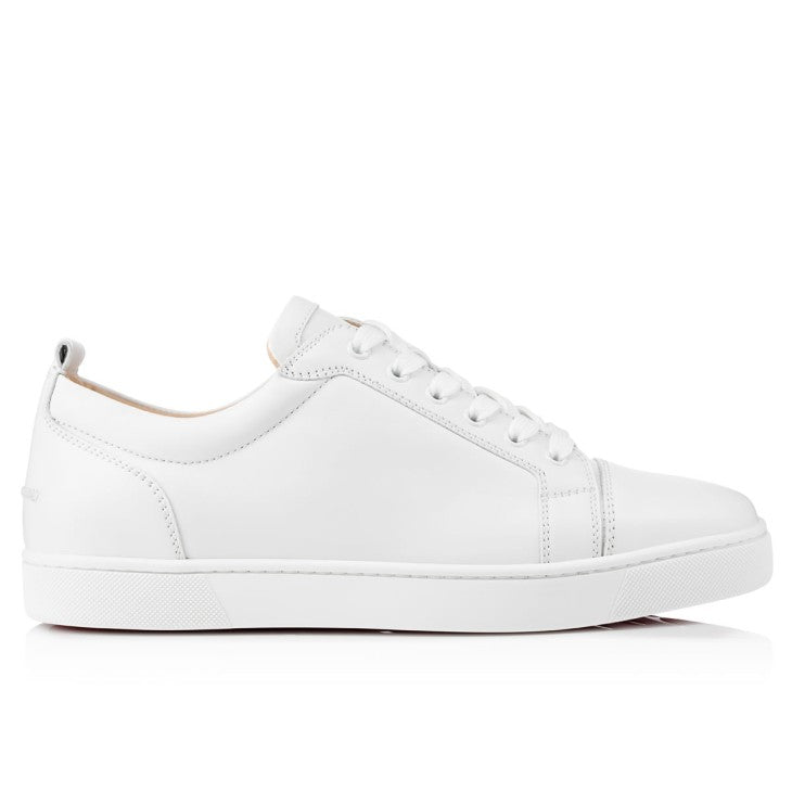 Christian Louboutin Junior shoe by ATHENA ™, featuring signature red sole and sleek design, displayed on a neutral background.