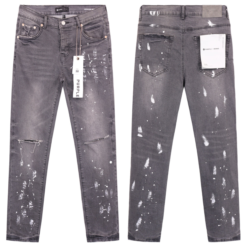 Purple ATHENA™ jeans with a slim fit, displayed on a model showing the front view and detailed stitching.