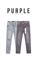 Purple ATHENA ™ jeans with a slim fit design, shown on a model, featuring classic five-pocket styling and a modern, stylish look.