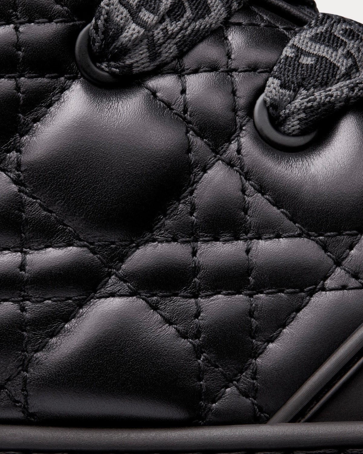 Dior B9 sneakers by ATHENA ™, featuring white leather and stylish design, displayed on a plain background.