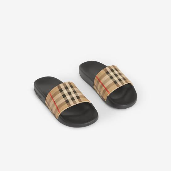 Athena™ Burberry slippers featuring a classic design, soft fabric, and comfortable slip-on style, shown in a close-up view.