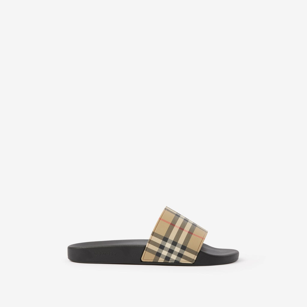 ATHENA™ Burberry slipper with plush fabric and classic check pattern, featuring a comfortable slip-on design.