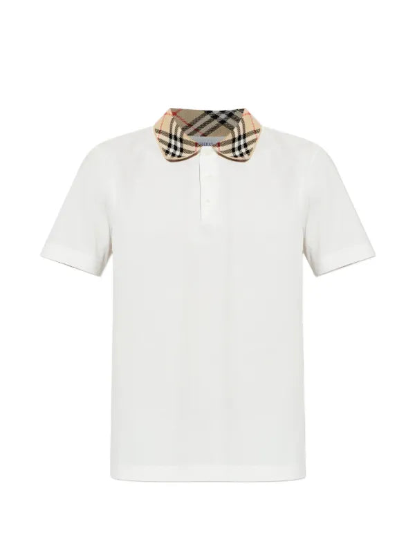 Athena™ Burberry polo shirt with classic collar and logo detail, shown on a mannequin. White fabric with subtle branding.