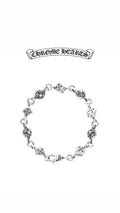 ATHENA™ Chrome Hearts dice bracelet featuring silver-tone metal and detailed dice charms on a sleek chain.