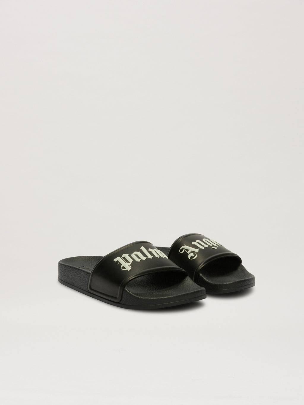 ATHENA™ Palm angles slides featuring a sleek design with textured straps and cushioned footbed, perfect for casual wear.