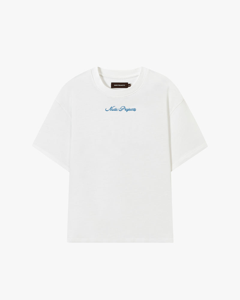 Athena ™ Nude Project Peach T-shirt displayed on a hanger with a soft peach color and casual fit.