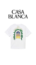 Athena Casa Blanca Avenida T-shirt displayed on a hanger, featuring a white cotton fabric with a stylish casual fit.